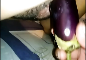 Fucking my tie the knot with a big eggplant