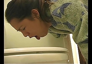 Gluttony woman hoist vomitus puking vomiting gagging